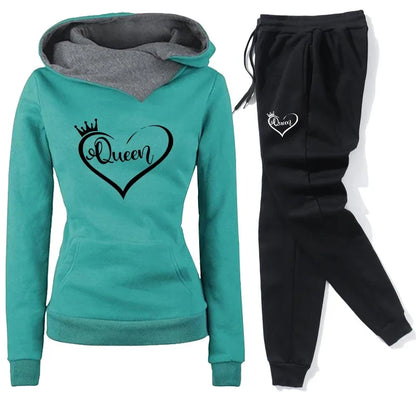 Luxurious women's outdoor tracksuit featuring a stylish hood, drawstring closure, and full-length design for elegant comfort during sports.