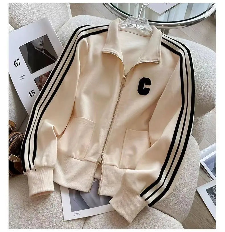 Wide leg pants from a luxurious women's two-piece sports set, ideal for autumn winter wear, accentuating comfort and style.