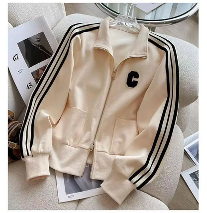 Wide leg pants from a luxurious women's two-piece sports set, ideal for autumn winter wear, accentuating comfort and style.