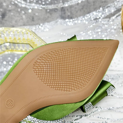 Elegant high-heeled African party sandals for women featuring exquisite crystal chain decoration and a stylish peep toe design, ideal for upscale occasions.