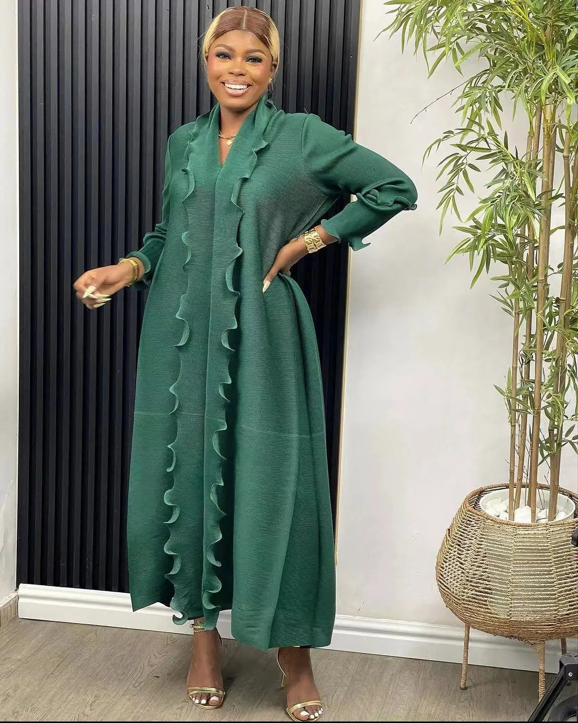 Luxurious ankle-length abaya dress showcasing a modern design with loose fit, perfect for middle-aged women looking for elegance and comfort during special occasions.