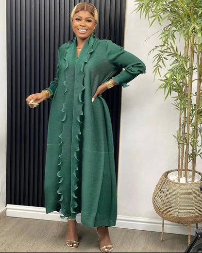 Luxurious ankle-length abaya dress showcasing a modern design with loose fit, perfect for middle-aged women looking for elegance and comfort during special occasions.