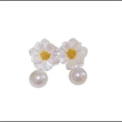 Stylish zinc alloy drop earrings with a unique plant shape pattern, embellished with beautiful flower petals and imitation pearls, ideal for trendy women's accessories.