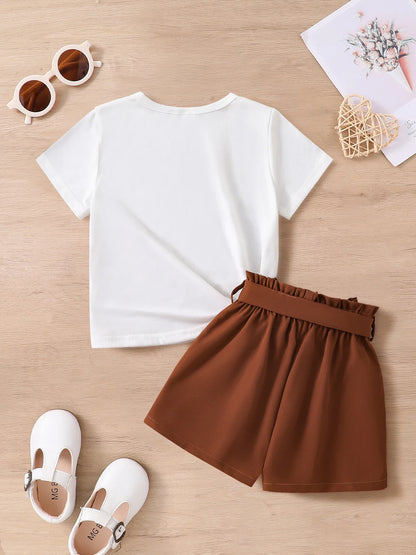 Close-up view of elegant brown slim fit shorts, part of a premium girls' summer 2-piece outfit, showcasing high-quality polyester fabric.