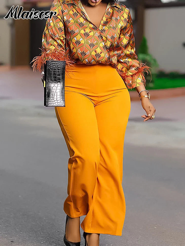 Chic Mlaiscsr Wide Leg Pants in a fashionable feather print, designed for the contemporary office lady, showcasing comfort and style in a high-waisted silhouette.