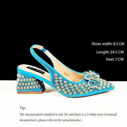Elegant QSGFC Sky Blue Italian High Heel Clutch Pumps adorned with vibrant full diamond embellishments, perfect for a sophisticated evening outfit.