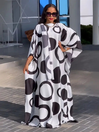 Elegant luxury chiffon abaya for women showcased in a stylish setting, perfect for weddings and evening events. This one-size caftan features exquisite satin fabric, embodying sophistication and grace.