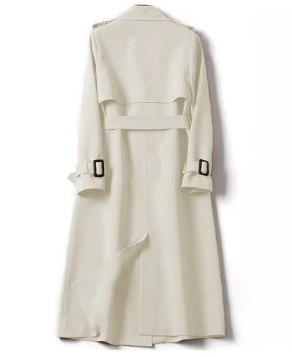 Chic solid patterned trench coat designed for women, embodying luxury and functionality with spacious pockets.