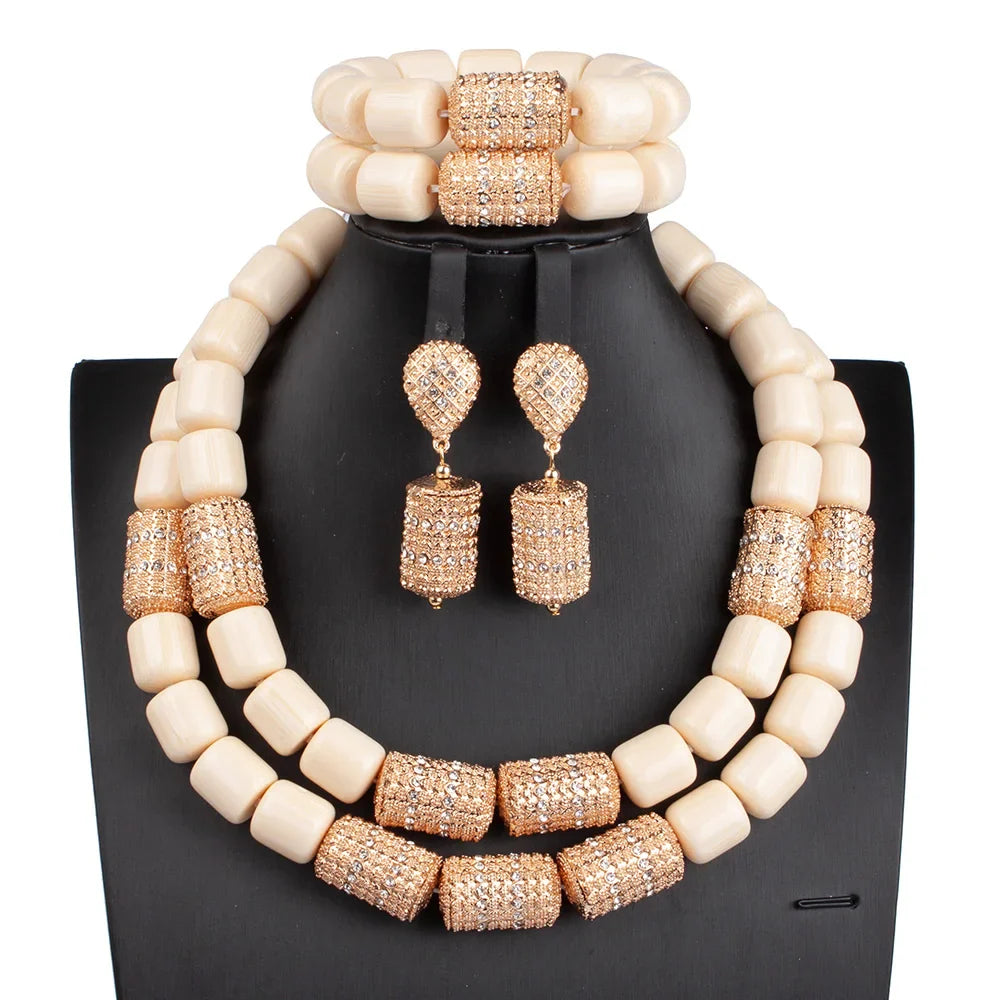 Elegant presentation of the luxury African beads jewellery set on a model, featuring a statement necklace with rich artificial coral, ideal for upscale events.