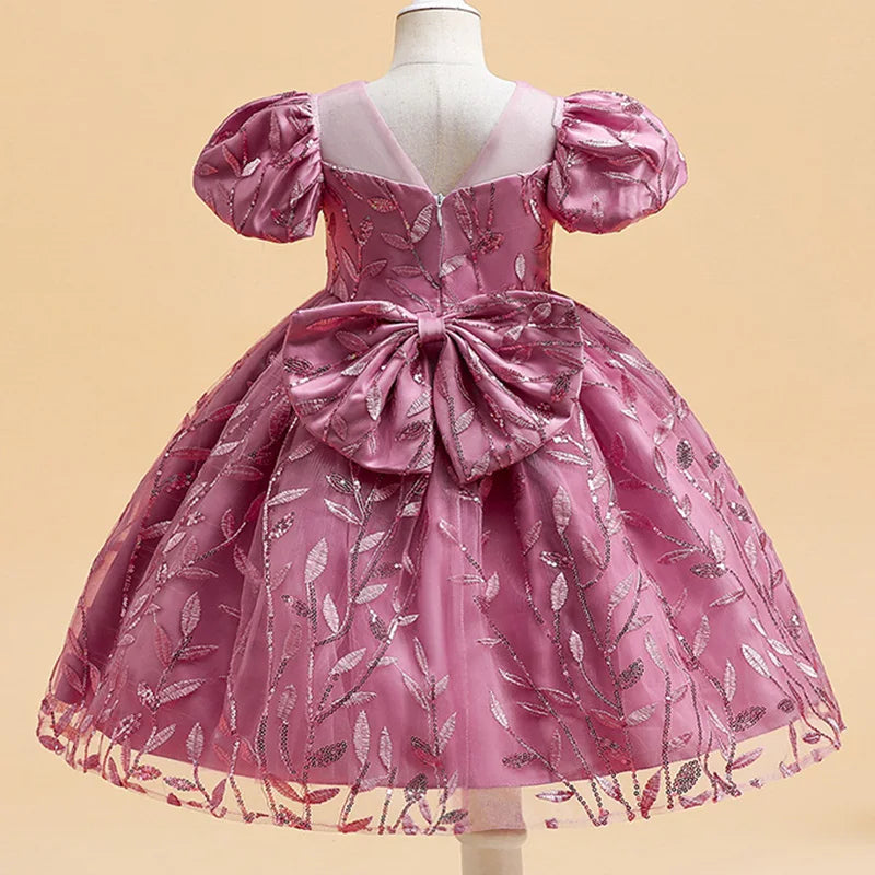 Charming knee-length Girls' Tutu Gown crafted from high-quality cotton and polyester, ideal for little ones looking to step into their fairy tale dreams.