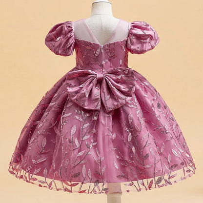 Charming knee-length Girls' Tutu Gown crafted from high-quality cotton and polyester, ideal for little ones looking to step into their fairy tale dreams.