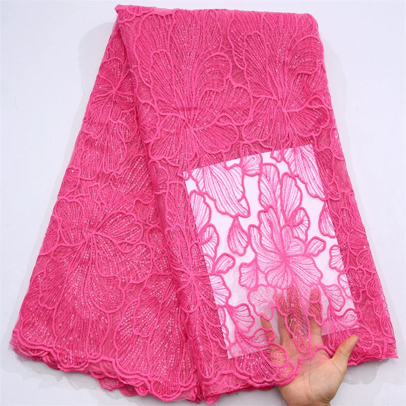 Stunning African Milk Silk Mesh Lace fabric detail showcasing intricate embroidery and sequins, perfect for luxurious bridal designs.