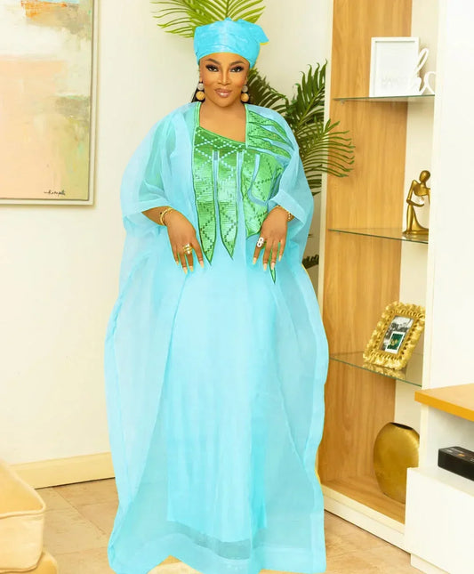 Elegant plus size African women’s abaya dress featuring exquisite embroidery, ideal for sophisticated parties and church events, crafted from high-quality polyester for a luxurious fit and style.