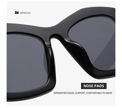 Stylish women's oversized sunglasses with a unique square frame and gradient orange lenses, offering superior UV400 protection.