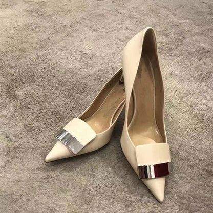 Luxury women's glitter high heel pumps with pointed toe design and elegant metal plate, perfect for weddings and upscale parties.