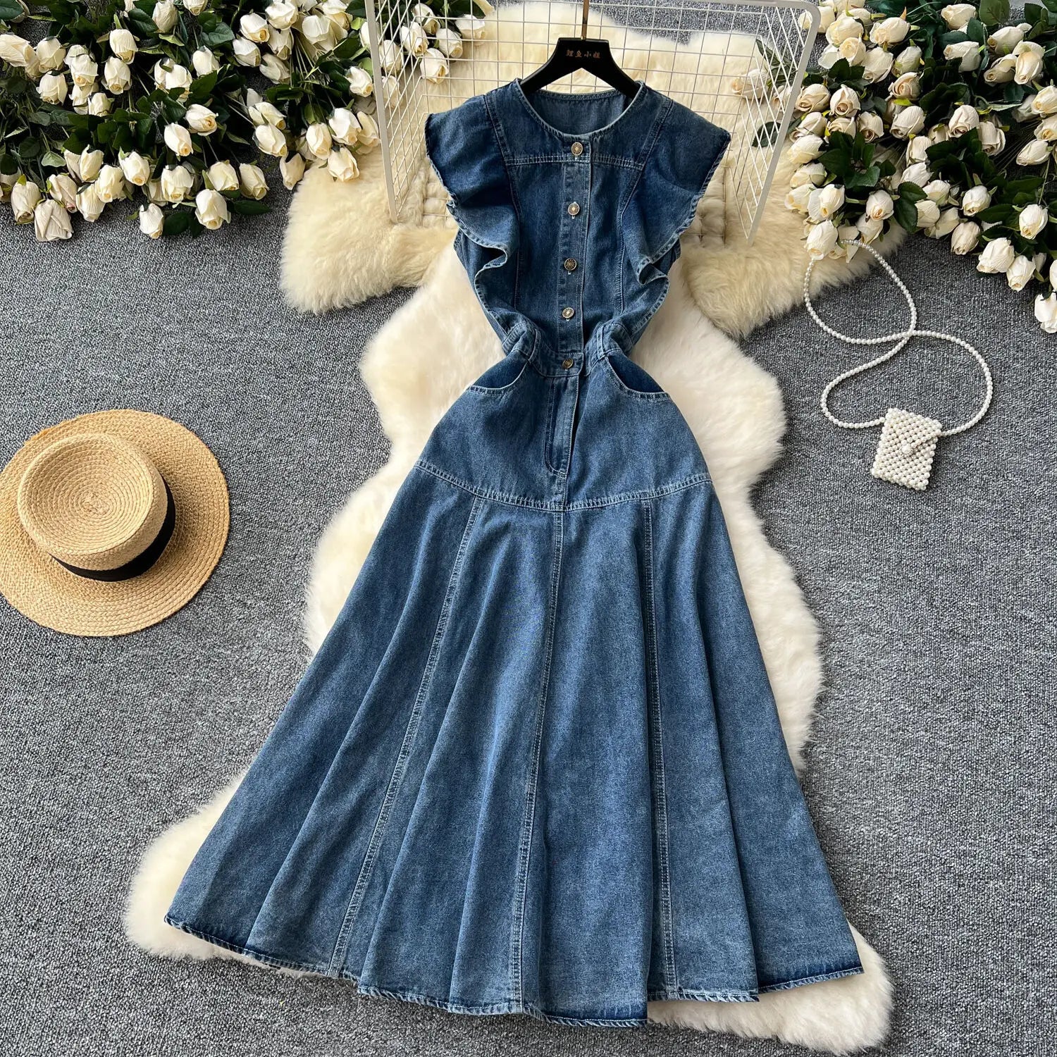 Beautiful silhouette of the WTHT Women's Sleeveless Denim Long Dress, showcasing a straight cut and natural waistline, perfect for casual elegance.