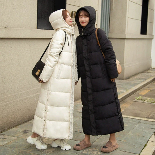 Chic long hooded parka coat made of premium cotton, designed by Hot Trends Area for luxurious warmth on chilly days.