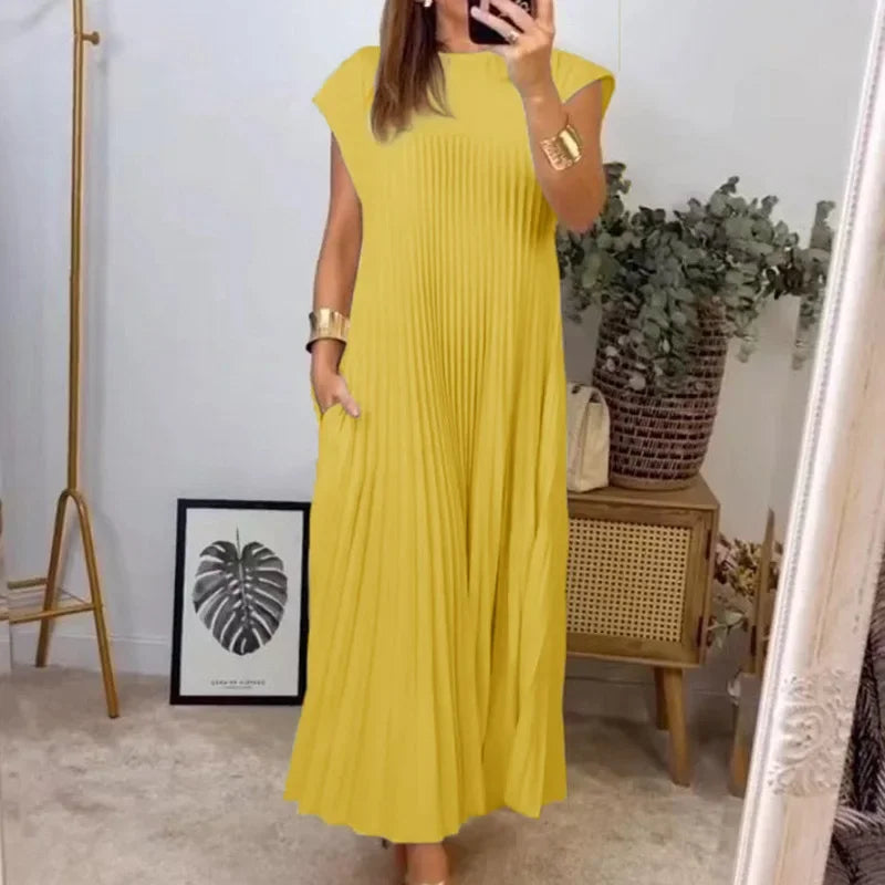 Elegant ladies' luxe solid maxi dress featuring a loose fit design, O-neck, and sleeveless cut, perfect for summer style.