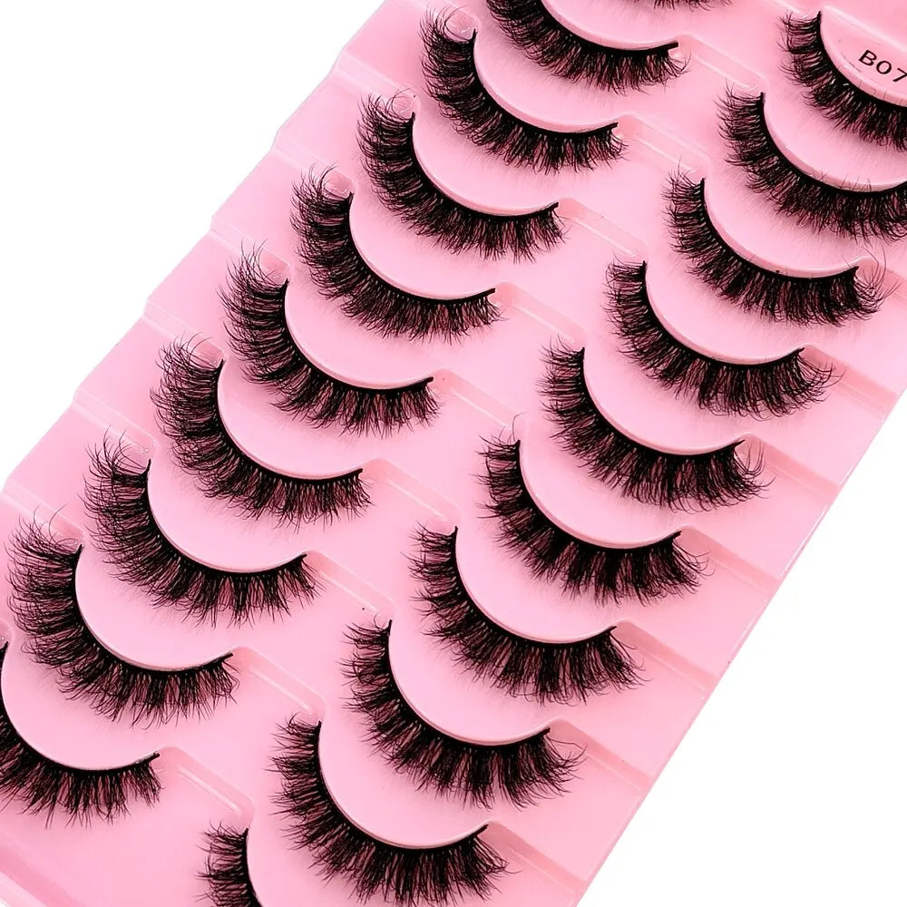 Dramatic 3D false eyelashes crafted from synthetic hair, beautifully shaped for a glamorous effect.