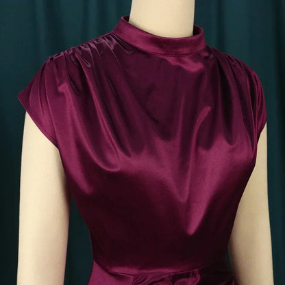 Sophisticated Burgundy Plus Size Dress with a sleek turtleneck design and ankle-length cut, perfect for upscale gatherings.