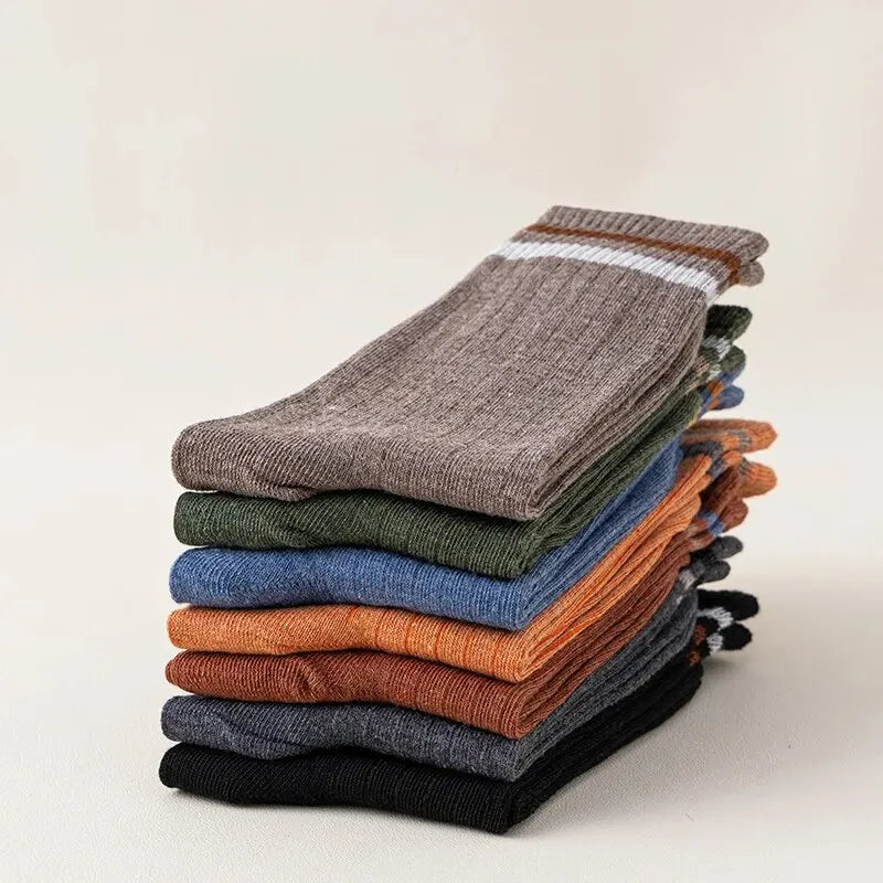 High-quality men's winter sports socks in a stylish pack of five, offering exceptional durability and comfort for active lifestyles.