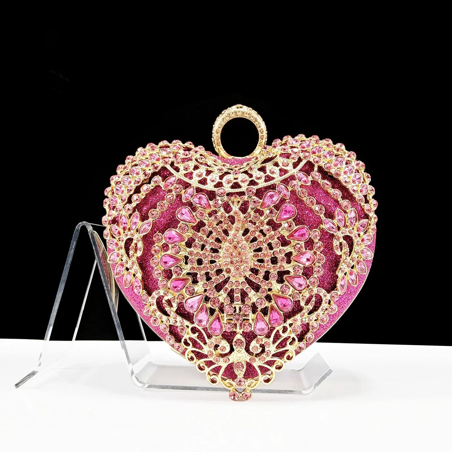 Luxury matching bag set in fuchsia by QSGFC, featuring a long chain shoulder strap and a chic buckle closure, perfect for pairing with the elegant women's heel pumps for a complete fashion statement.