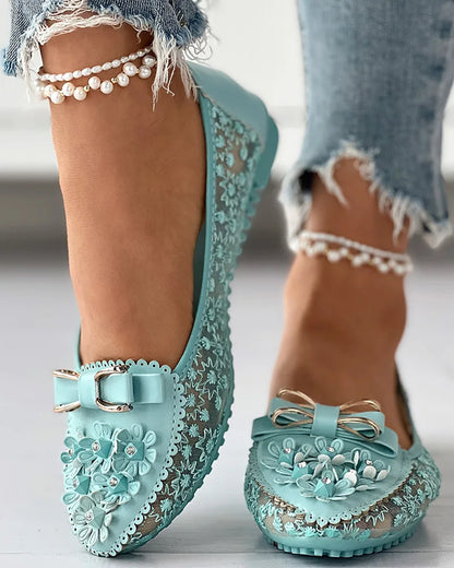 Luxurious women's summer loafers featuring exquisite floral embroidery and bowknot design, crafted for ultimate comfort in a breathable vulcanized style.