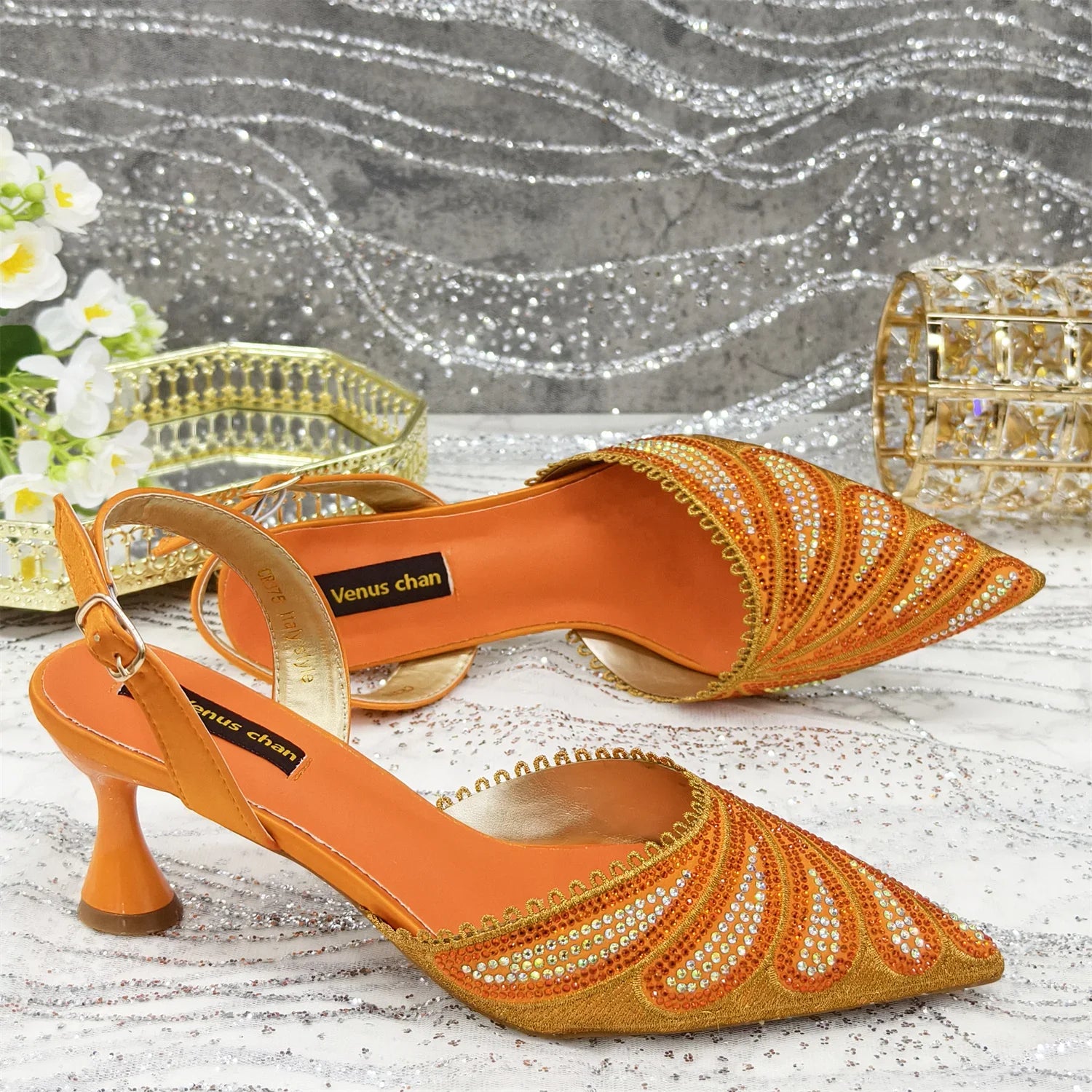 Close-up view of the elegant high heel shoe and matching handbag set, highlighting the intricate detailing and luxury finishing suited for upscale events.