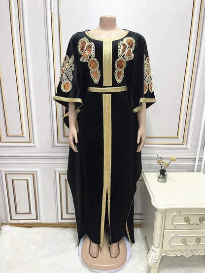 Elegant golden velvet Ramadan abaya dress featuring a bat sleeve design and intricate sequins for luxurious Muslim fashion.