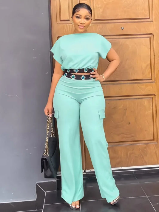 Luxury women's 2-piece summer-fall casual set featuring a stylish short-sleeve pullover and elegant ankle-length trousers, perfect for sophisticated outdoor gatherings.