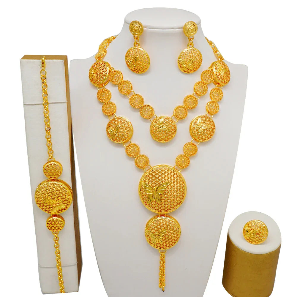 Complete luxury gold jewellery set for brides, including earrings, necklace, bracelet, and ring in African design.