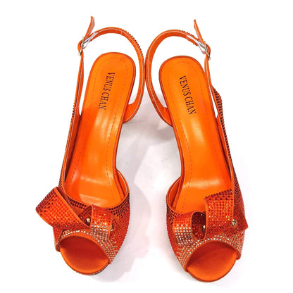 Venus Chan elegant peach rhinestone high heels for women, showcasing a luxurious design perfect for summer parties, featuring a peep toe and spike heels.
