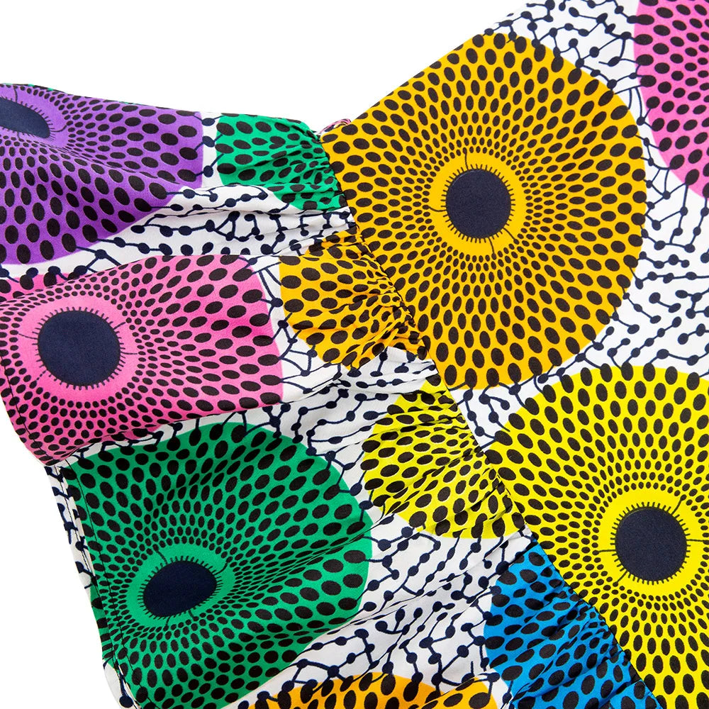 Stylish African clothing for women, showcasing exquisite craftsmanship in vibrant Ankara fabric.