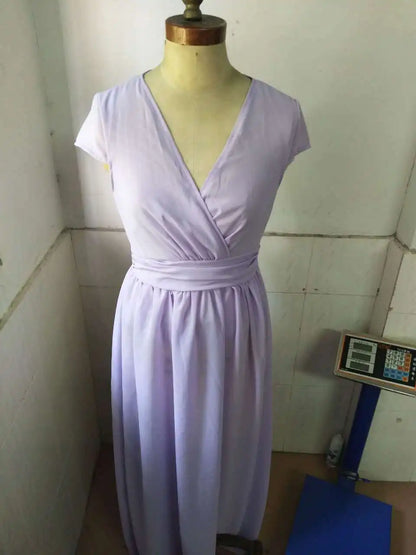 Stunning V-neck chiffon dress on a mannequin, highlighting the slim fit and classic design for an elegant women's fashion statement.