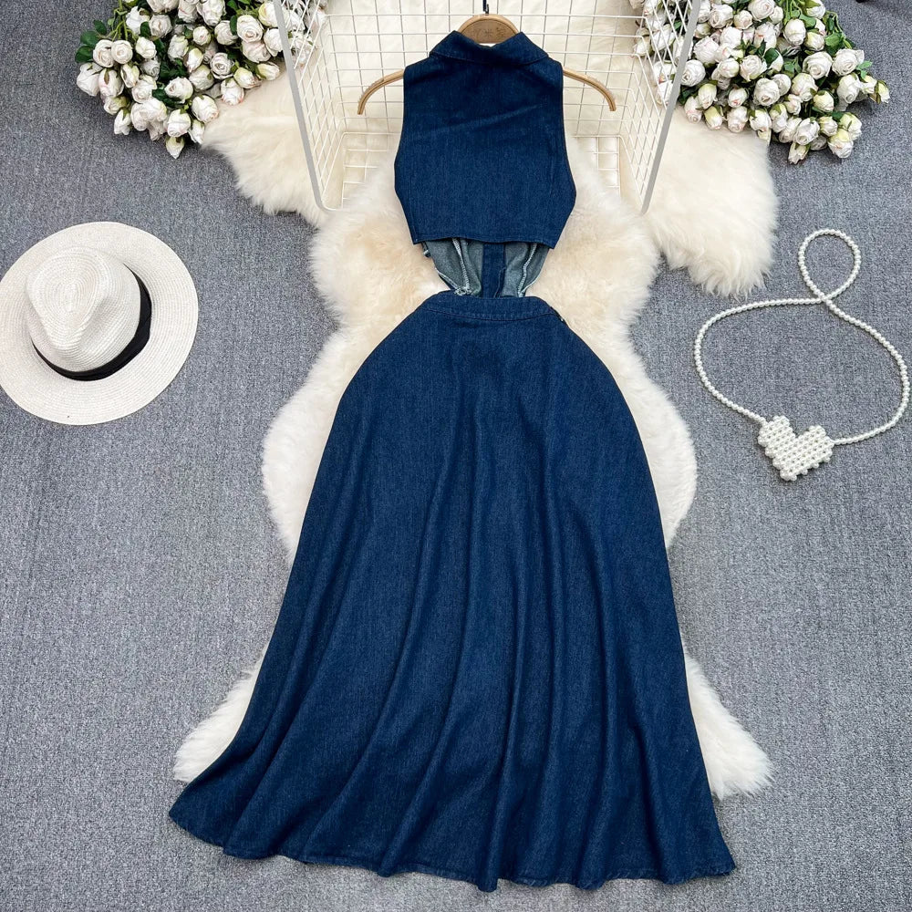 Model showcasing the graceful A-line cut of the elegant denim dress, emphasising its perfect fit and casual luxury.