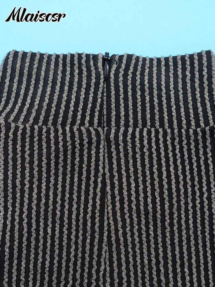 Stylish Mlaiscsr long sleeve knit dress with an O-neckline, embodying elegance and sophistication for evening events.