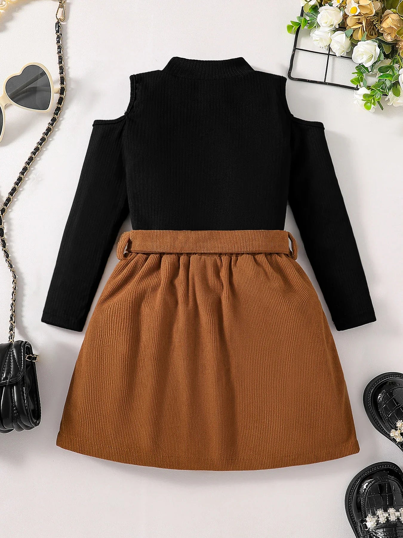 Chic and sophisticated autumn outfit for girls, showcasing a refined off shoulder turtleneck and a fashionable half skirt, perfect for ages 4-6 years in high-quality polyester.