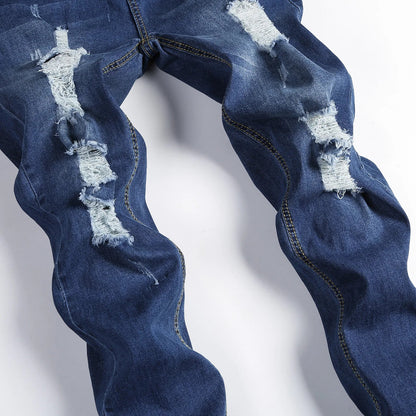 Chic men's ripped skinny jeans showcasing a contemporary vintage stonewashed finish, ideal for casual wear and stylish everyday outfits.