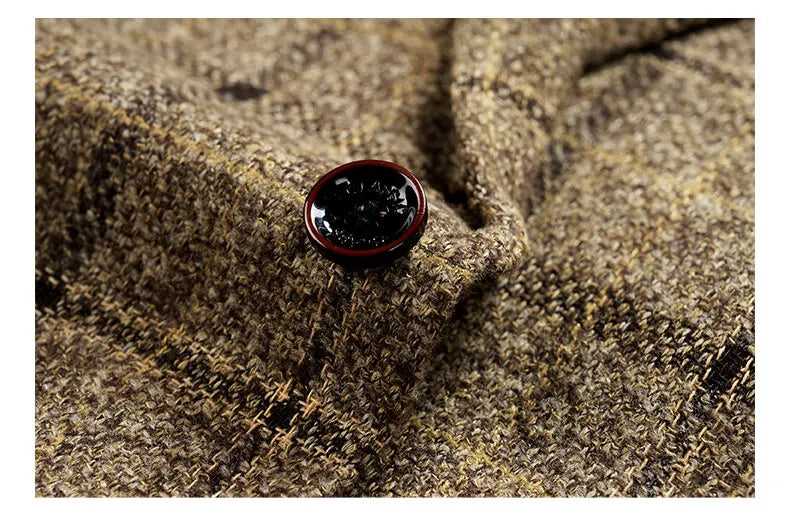 Close-up of the luxurious fabric and exquisite design details of a men's one-button suit set ideal for autumn occasions.