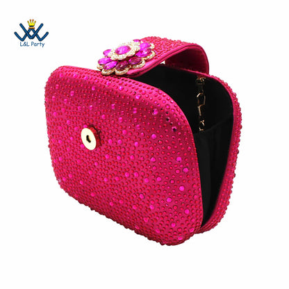 Elegant luxury magenta peep toe party pumps adorned with sparkling crystals, showcasing a stylish buckle strap design.