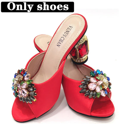 Pair of stunning yellow rhinestone stiletto heels showcasing a round toe and elegant detailing, ideal for sophisticated occasions.