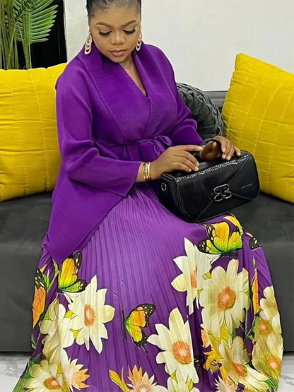 Sophisticated plus size autumn outfit consisting of a loose batwing top and stylish pleated skirt, ideal for all occasions.