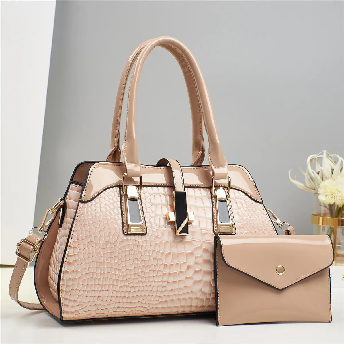 Elegant bright leather purse featuring serpent pattern design, ideal for fashion-forward women.