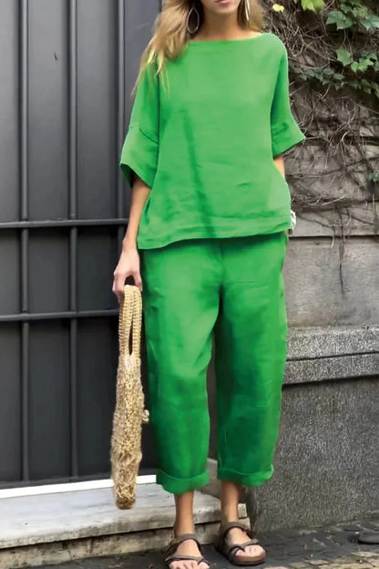 Stylish and sophisticated plus-size women's pant suit set, featuring lightweight polyester cotton fabric, ideal for spring/summer occasions.