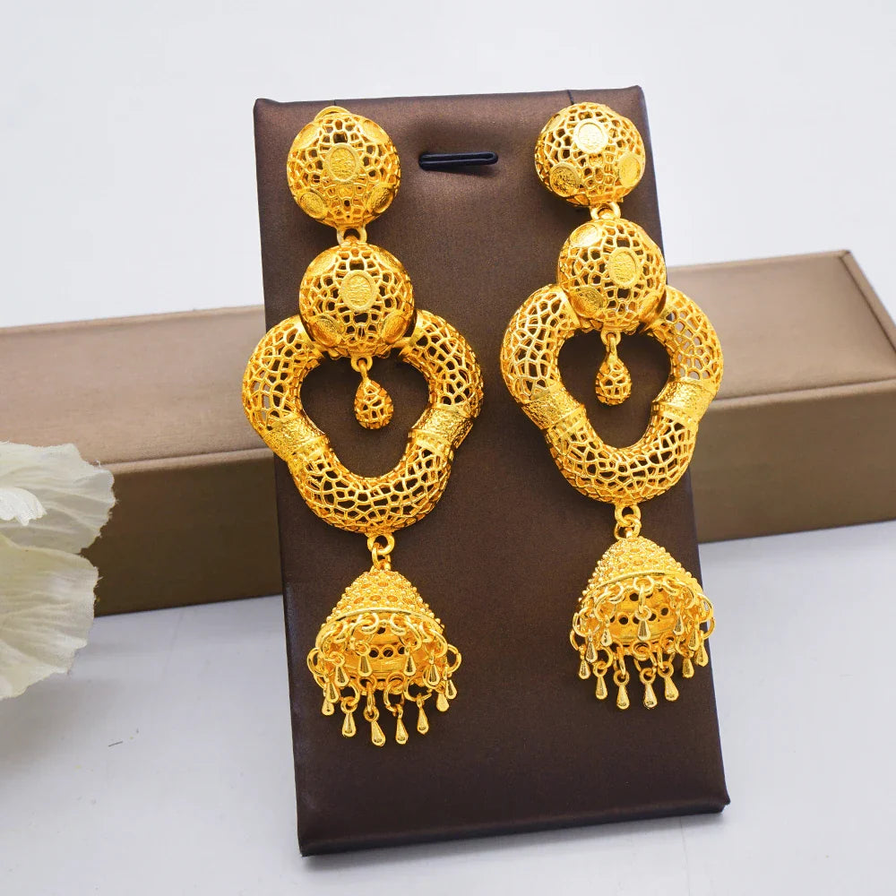 Exquisite close-up of Trendy Bohemia Long Tassel Earrings showcasing geometric African gold drop design, perfect for weddings and elegant occasions.