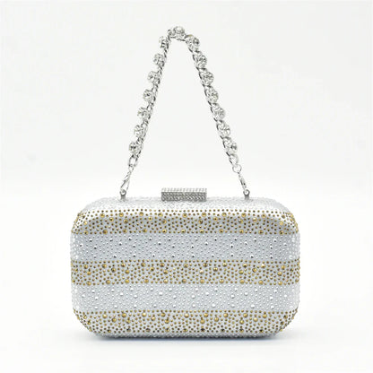 Luxurious Italian designer shoe and bag set featuring crystal embellished pumps in elegant silver, perfect for summer parties.