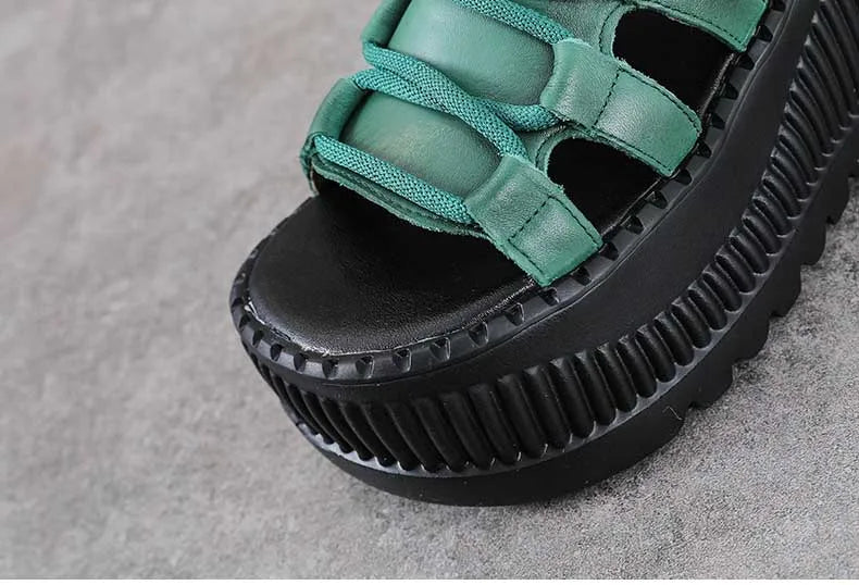 Chic Koznoy wedge booties with zip closure and ethnic pattern, perfect for a luxurious summer outfit.