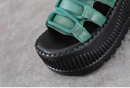 Chic Koznoy wedge booties with zip closure and ethnic pattern, perfect for a luxurious summer outfit.