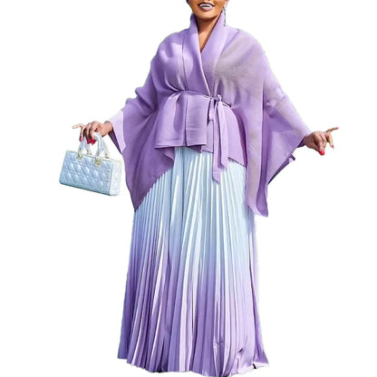 Full ensemble of the women’s luxury Dashiki outfit laid out elegantly, highlighting the rich colours and textures, perfect for cultural events and celebrations.