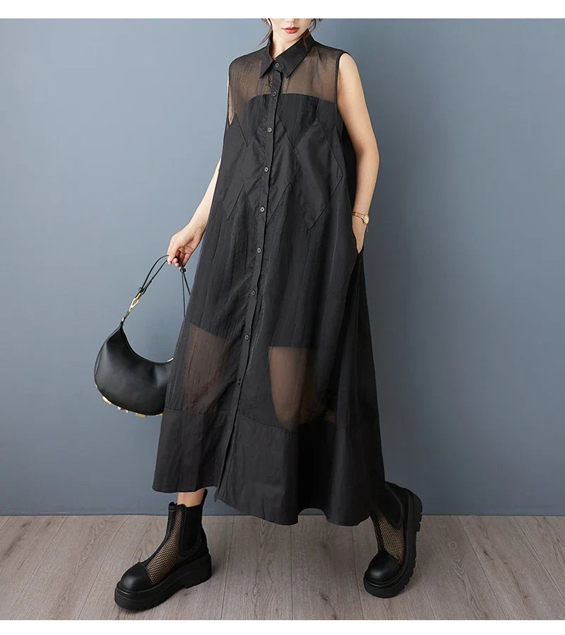 Display of the NYFS Loose Plus Size Organya Splicing Casual Shirt Dress, emphasizing its solid pattern and elegant neckline ideal for stylish summer wear.